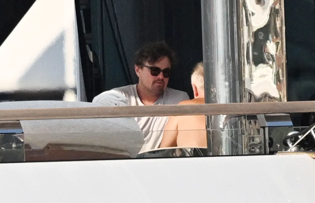 Leonardo DiCaprio relaxing on a luxury yacht in Saint-Tropez.