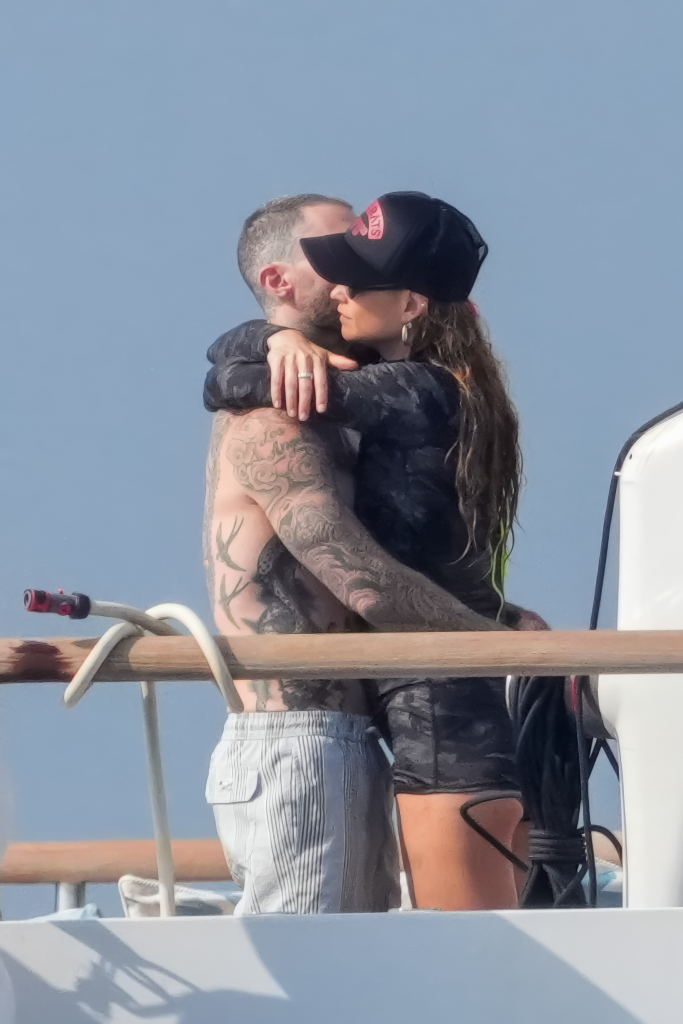 Adam Levine and Behati Prinsloo embrace on a luxury yacht in Saint-Tropez.