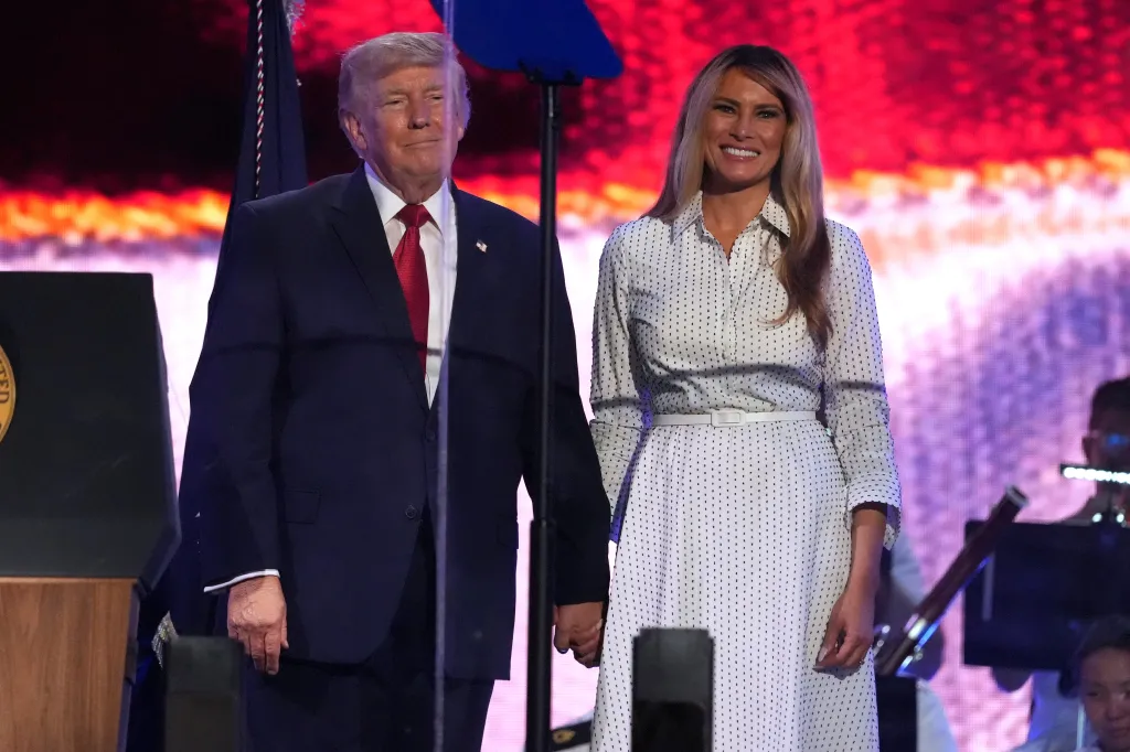 President Donald Trump and First Lady Melania Trump appear on stage at the Salute to America event.