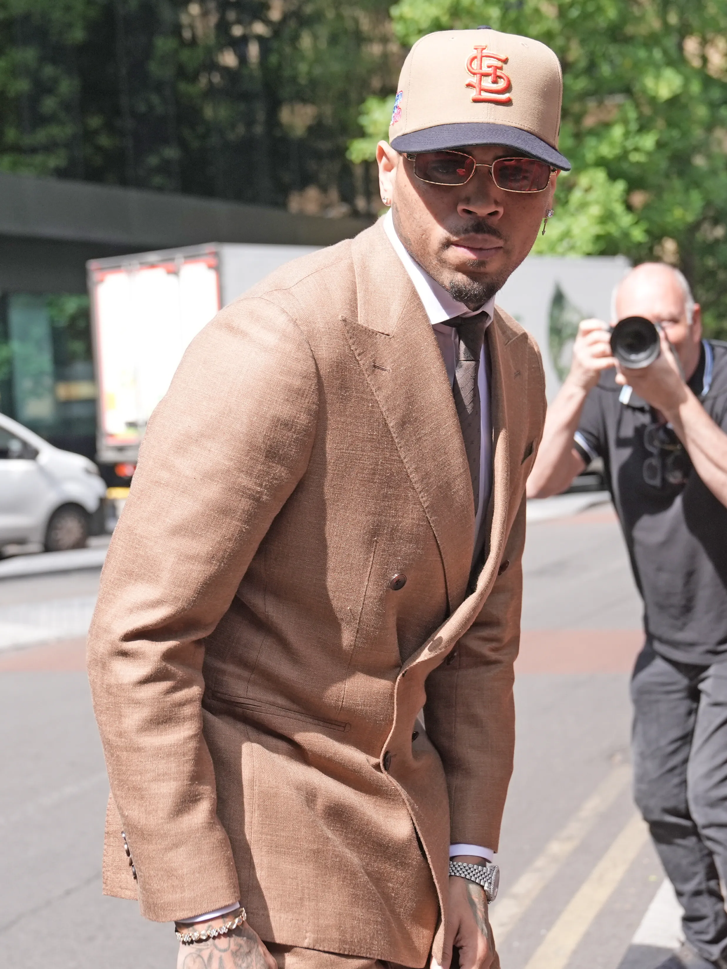 Chris Brown arrives at Southwark Crown Court in London on July 24