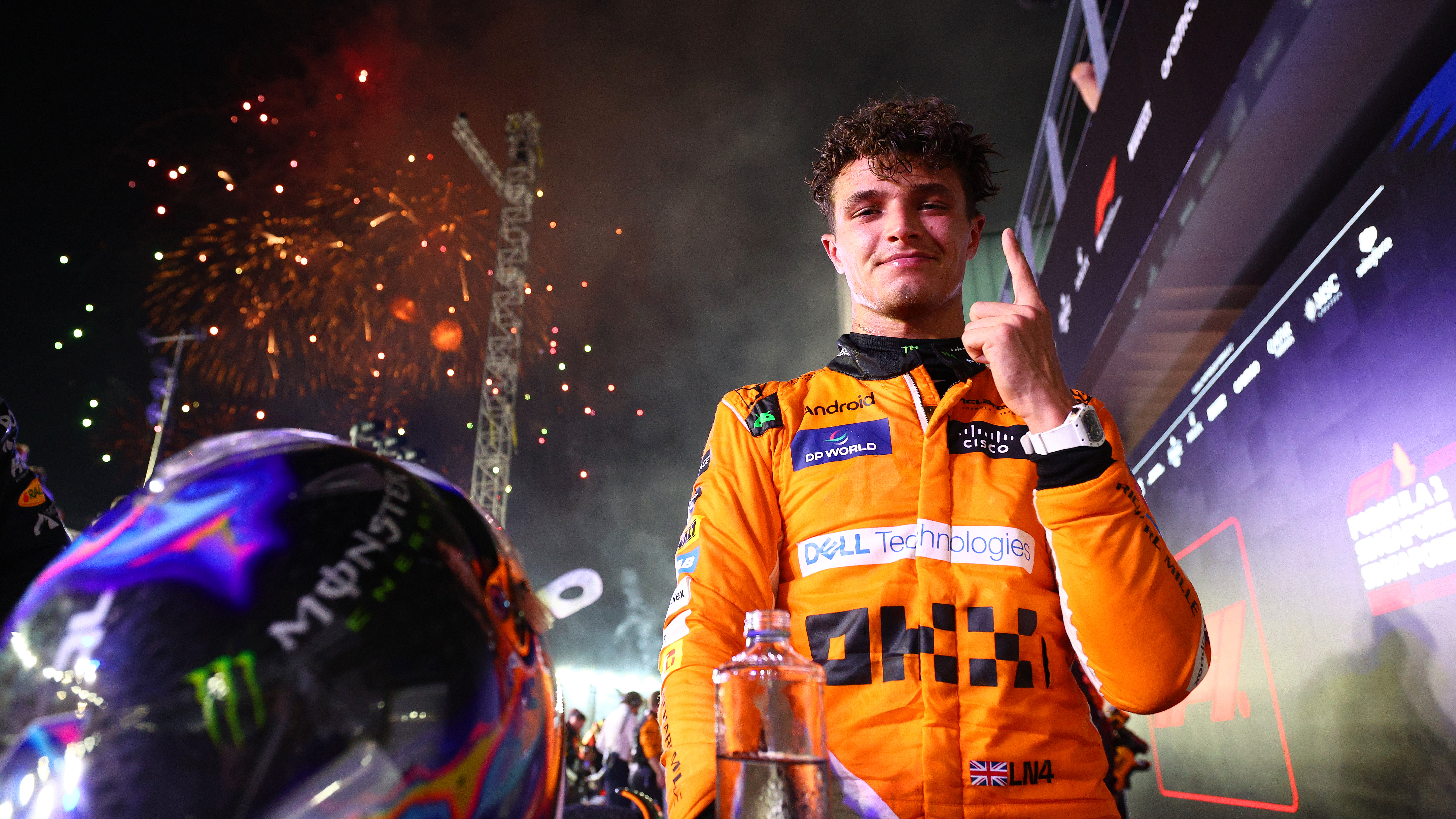 Race winner Lando Norris of Great Britain and McLaren celebrates in parc ferme during the F1 Grand Prix of Singapore.