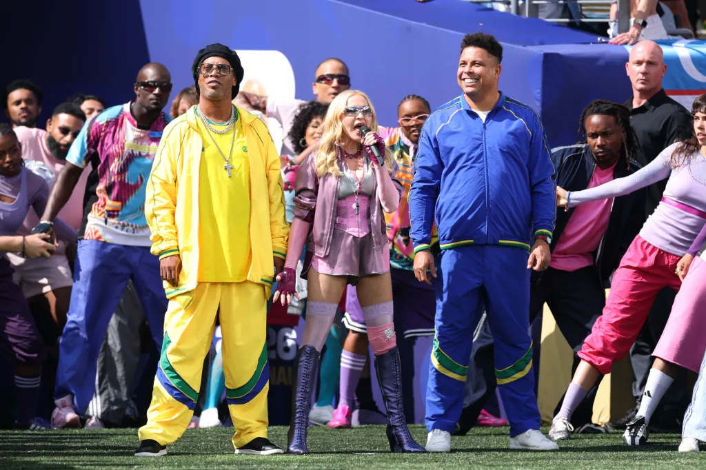 Ronaldinho, Madonna, and Ronaldo perform during the Topps Final Halftime Show.