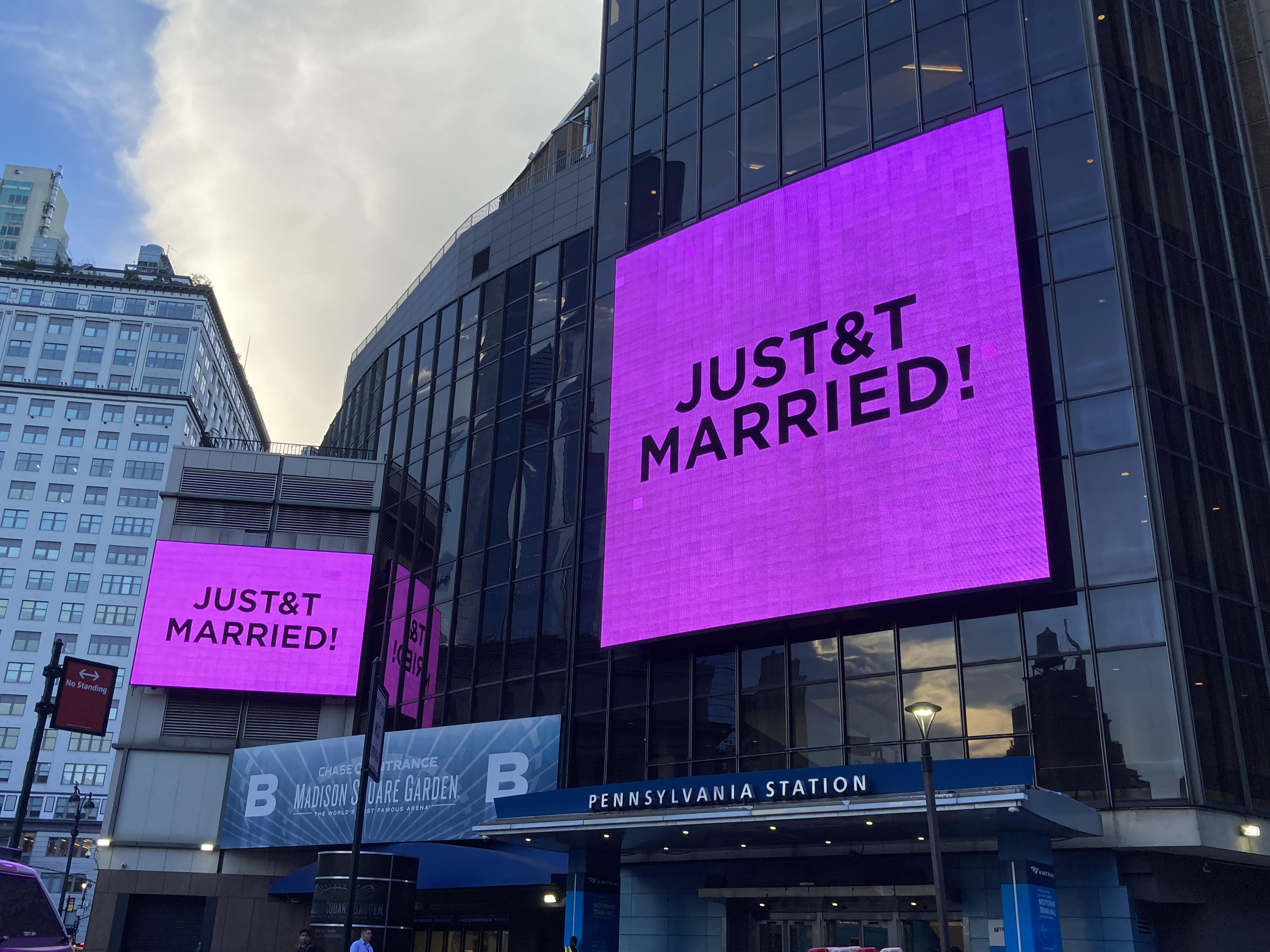Large billboards outside Madison Square Garden reading 