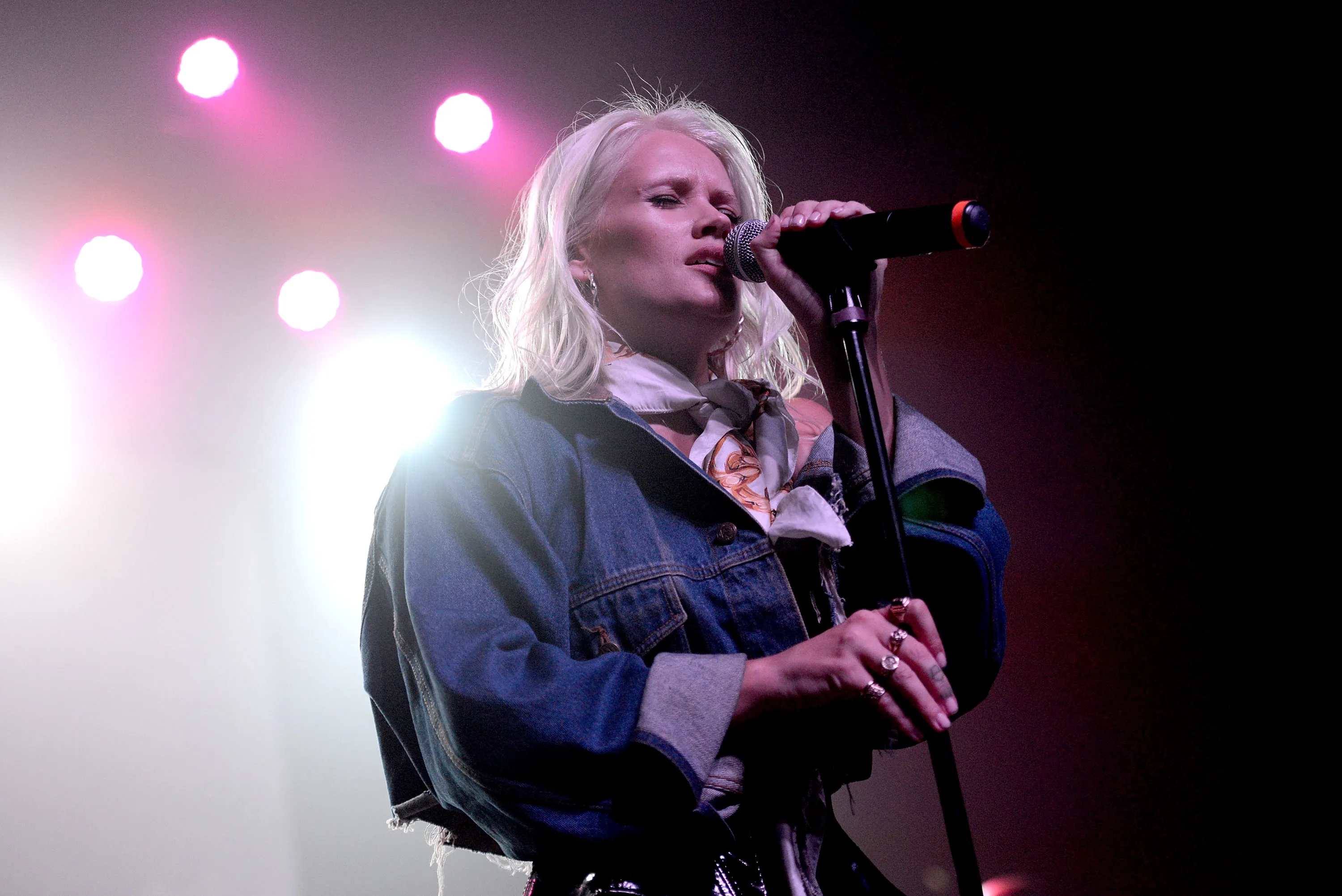 Singer Lauren Bennett of G.R.L performs on stage.