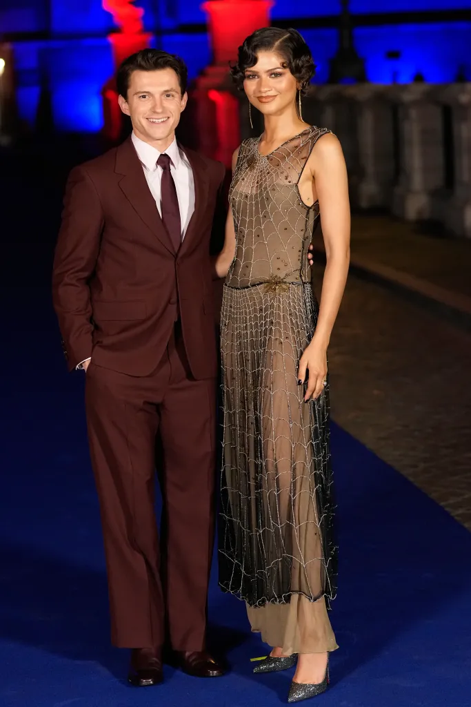 Tom Holland and Zendaya pose on the red carpet at the 