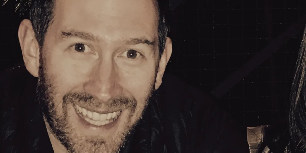 Ian smiling in 