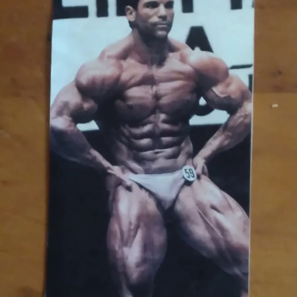 Bodybuilding champion Antonio Hernandez Torres posing on stage.
