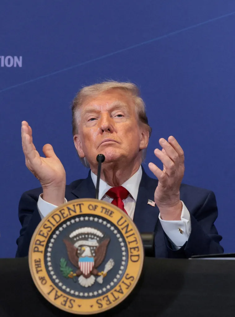 U.S. President Donald Trump applauds at the Pennsylvania Defense and Innovation Summit.