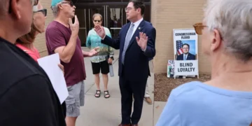 GOP lawmaker showered with boos  from angry town hall attendees for supporting Trump bill