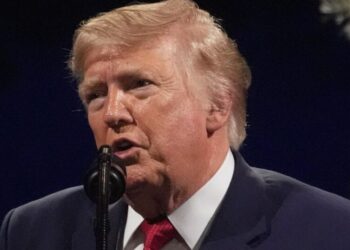 Trump posts doctored photo of the Obamas and Air Force One with graffiti spray-painted on plane