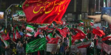 Iran says it is suspending commitments to interim deal with U.S. as they exchange attacks