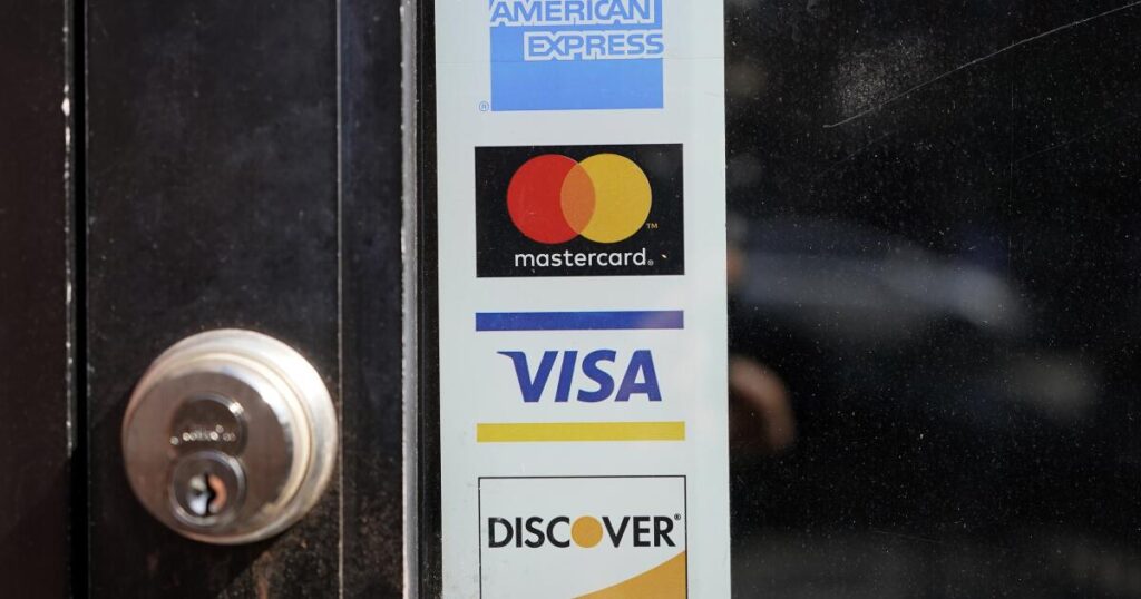 Are businesses allowed to charge me to use my credit card?