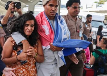 Cuban dissident, exiled from country after 5 years in prison, arrives in U.S.