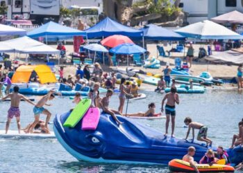 Some beachgoers are creating living rooms with a view on the sand. Cities are cracking down