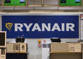 Passenger partly sucked out of window soon after takeoff from Greece but others pull him back in
