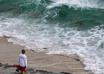 California lifeguards are rescuing thousands during high surf, heat waves this summer