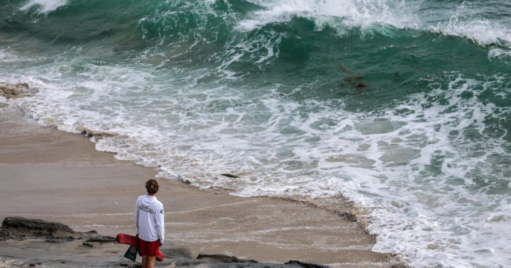 California lifeguards are rescuing thousands during high surf, heat waves this summer