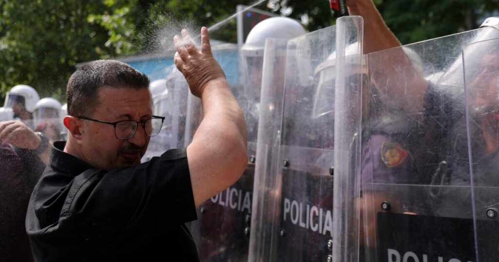 Albanian police use tear gas and pepper spray as Tirana protest turns violent