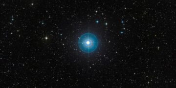 Faint new planet is revealed around a young star after a decade in hiding