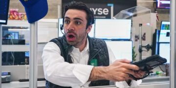 Stocks waver on Wall Street while crude oil prices fall for the first time in a week