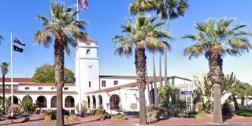 Orange County man charged with killing his mother in her car in front of police station
