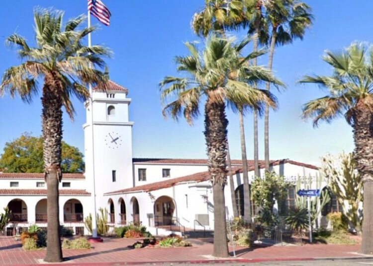 Orange County man charged with killing his mother in her car in front of police station