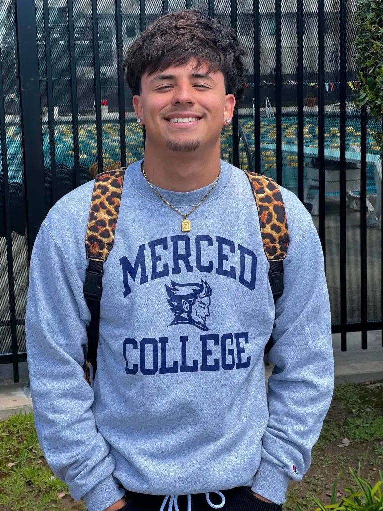 Bobby Criado wearing a grey 