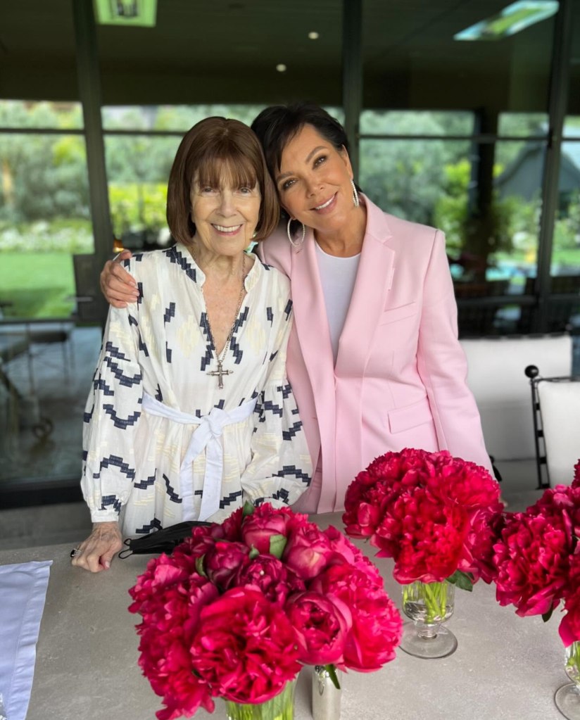 Kris Jenner in a pink blazer with her mother Mary Jo Campbell in a white patterned dress.