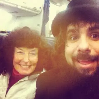 Fernando Perdomo and Linda Perhacs on an airplane.
