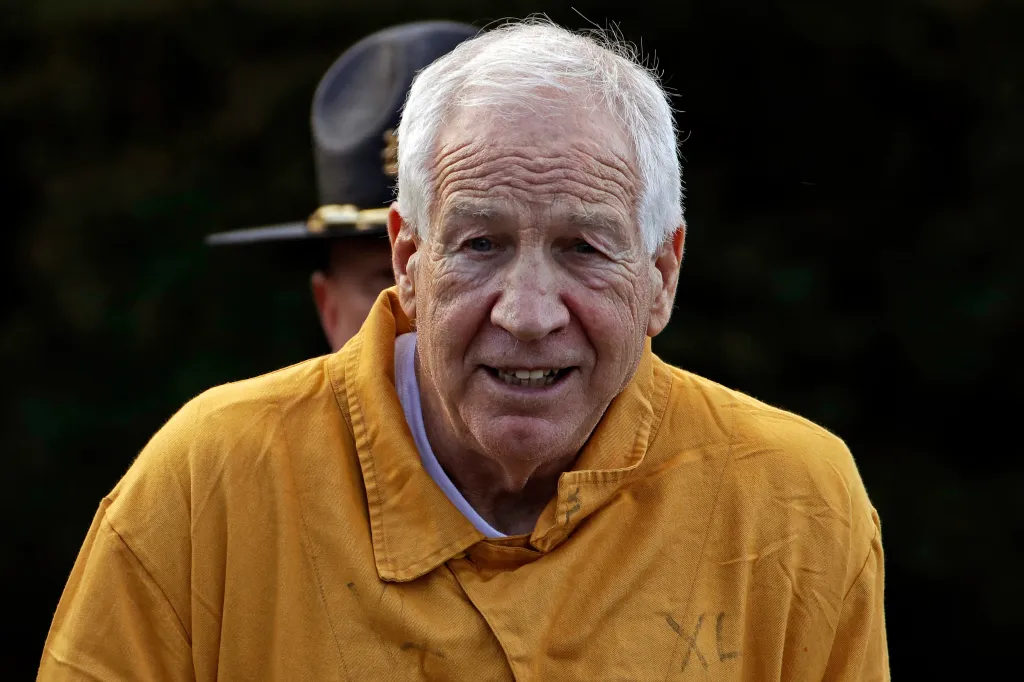 Former Penn State assistant football coach Jerry Sandusky in an orange jumpsuit.