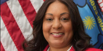 Former Police Official Is Accused of Helping Her Son Flee a Shooting