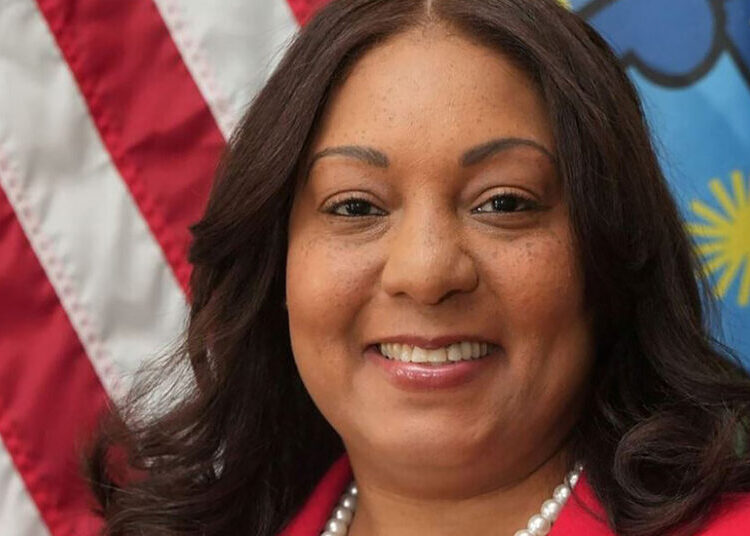 Former Police Official Is Accused of Helping Her Son Flee a Shooting