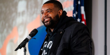 Congressman Is Ousted by Democratic Socialist in Michigan House Primary