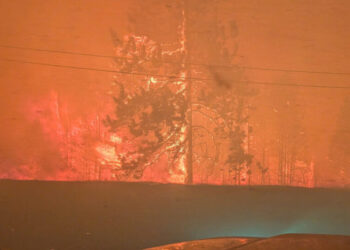 ‘Out of Control’ Wildfire Forces Evacuation of 18,000 People in Canada