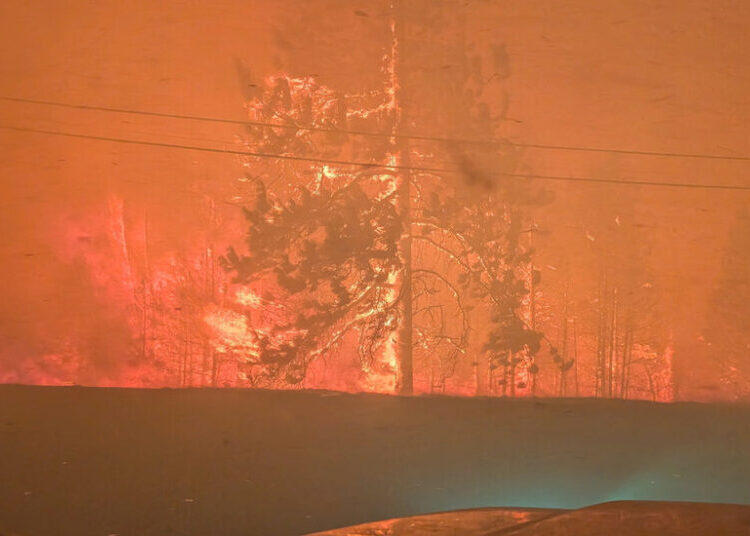 ‘Out of Control’ Wildfire Forces Evacuation of 18,000 People in Canada