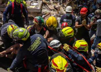 Shouting Names, Hoping for Replies and Digging for Survivors of Colombian Quake