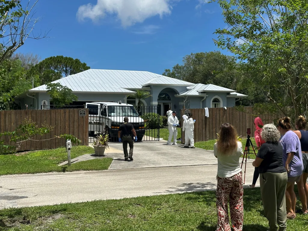 Sheriff's officials investigating an animal hoarding case at a residence in Palm City.