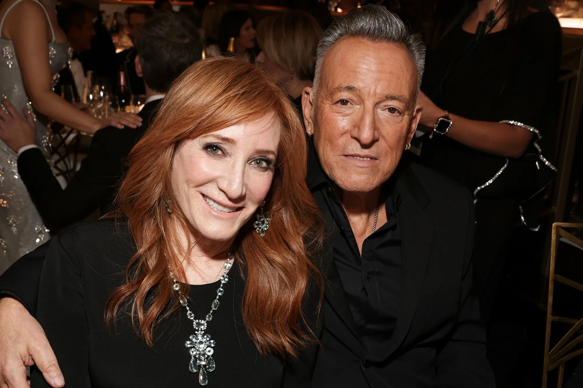 Bruce Springsteen and Patti Scialfa posing for a photo.