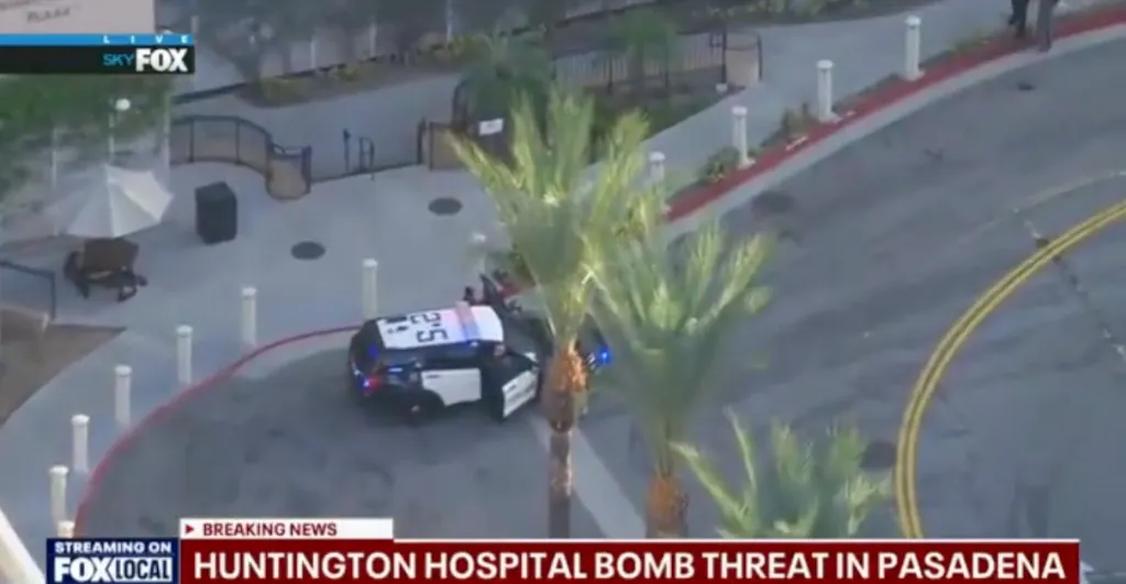 Police car outside Huntington Hospital during a bomb threat in Pasadena.