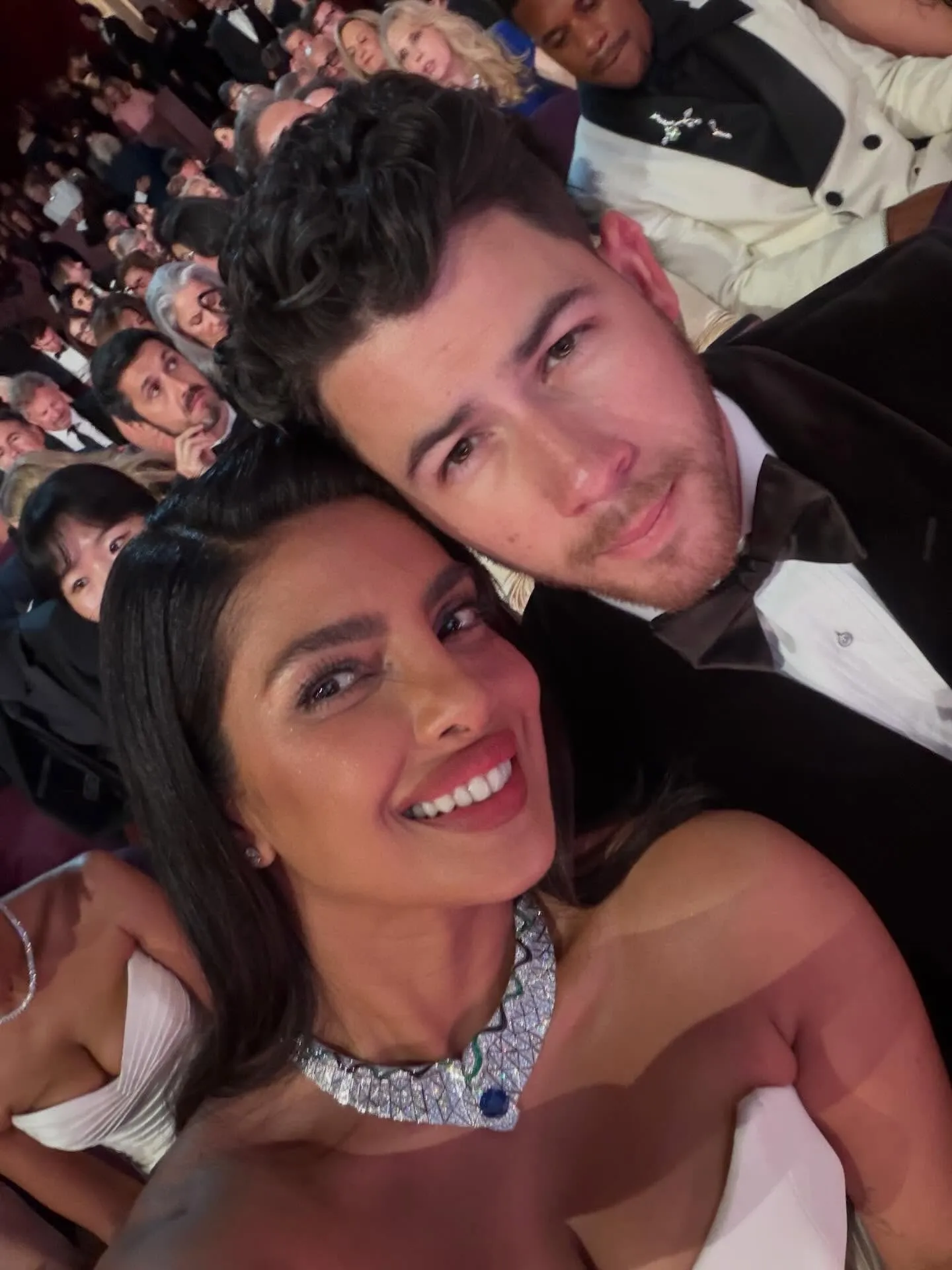 Priyanka Chopra and Nick Jonas posing for a social media selfie.