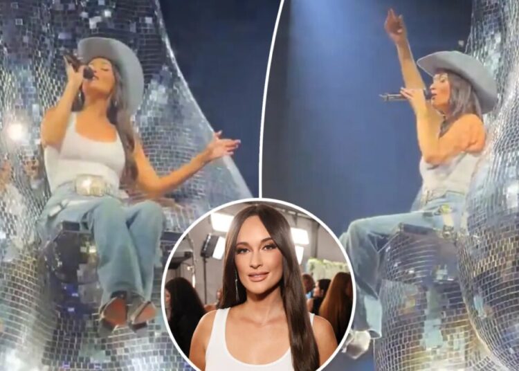 Kacey Musgraves sings atop giant ‘disco balls’ during cheeky tour performance