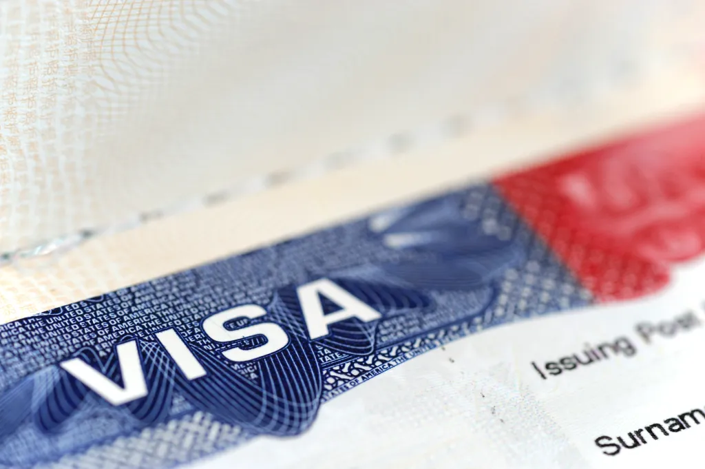 Close-up of a United States visa stamp in a passport.