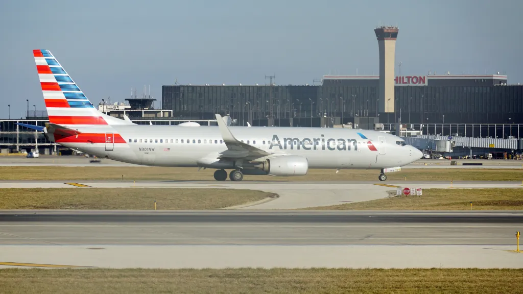American Airlines Boeing 737 taxiing on the runway at Chicago O'Hare International Airport.