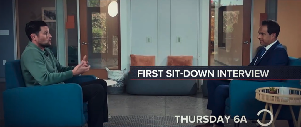 Two men in chairs during a