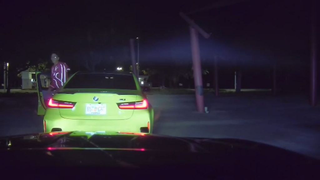 As the patrol vehicle reached the scene, people could be seen running between vehicles while others scrambled back behind the wheel.