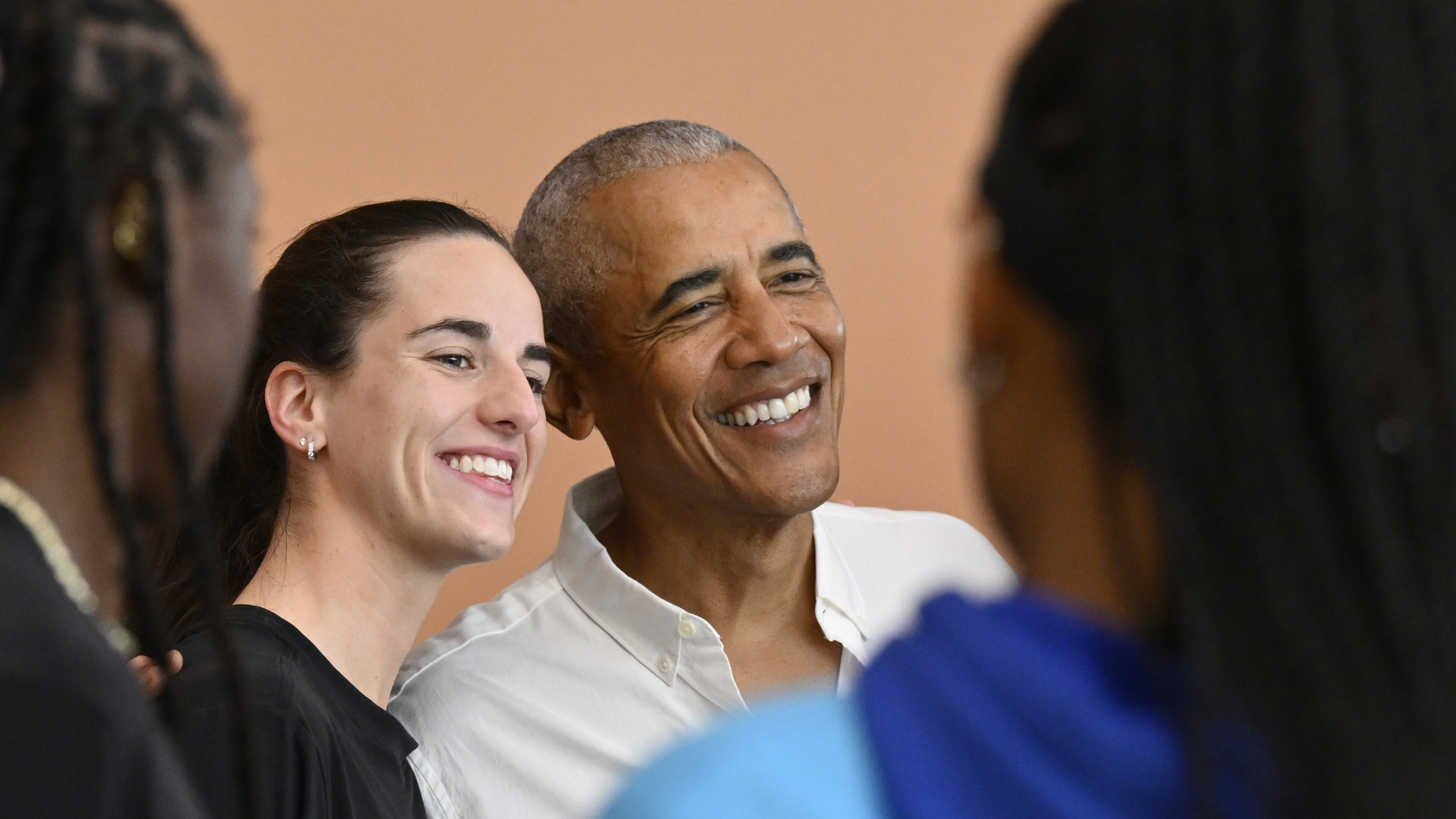 Barack Obama poses with Caitlin Clark during the WNBA All Star weekend.