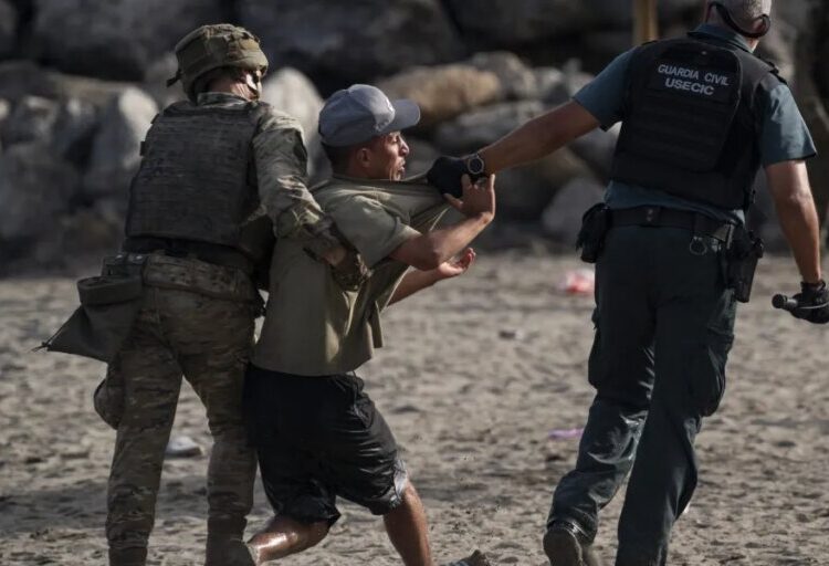 Spain puts up a 1,600-foot sea barrier between Ceuta and Morocco after EU states warn against ‘uncontrolled mass crossings’