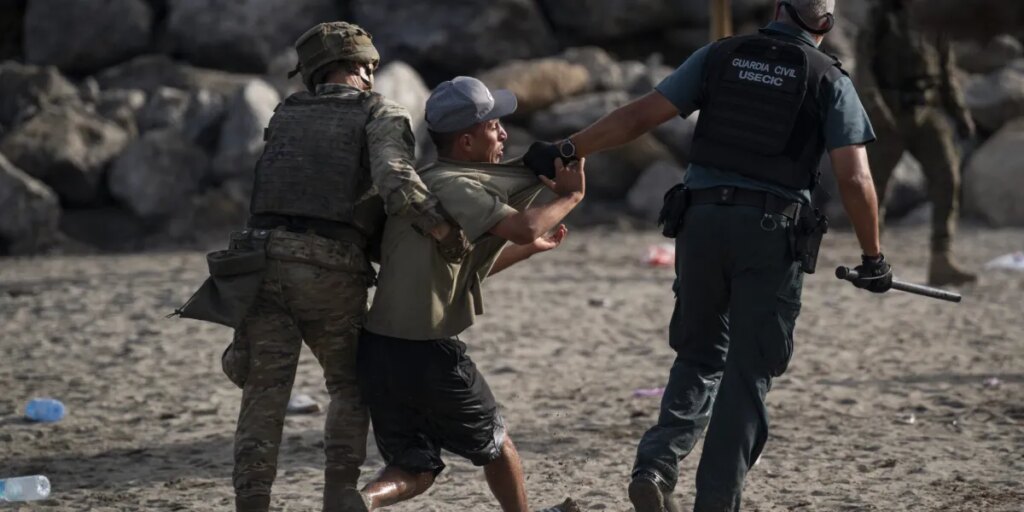 Spain puts up a 1,600-foot sea barrier between Ceuta and Morocco after EU states warn against ‘uncontrolled mass crossings’