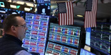 Oil tumbles and stock futures surge after Trump said Iran deal was near