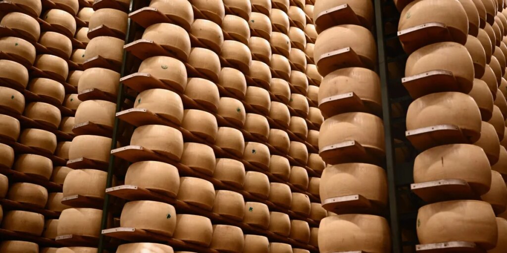 Italy’s $4.7 billion cheese economy is feeling the heat as climate change threatens its cheese banks that hold Parmigiano wheels as loan collateral